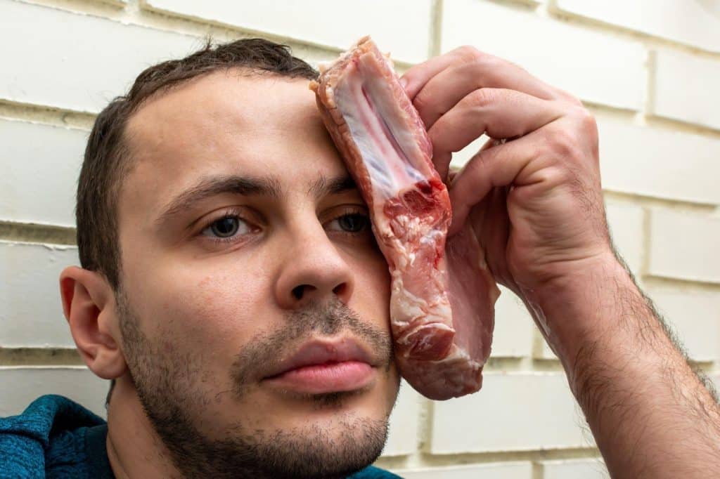 steak or raw meat on eyes